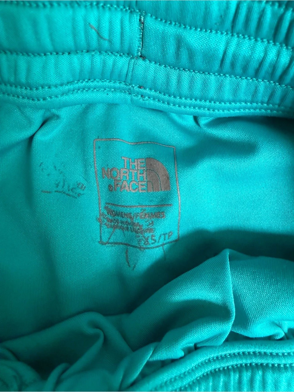 The North Face Women’s Gray Athletic Shorts with Teal Trim